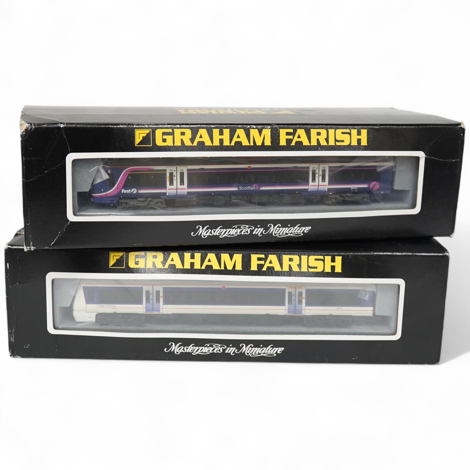 Two boxed Graham Farish N gauge railway DMU train packs; a Scotrail 170/4 3-car DMU (371-428), and a Chiltern Railways 168/1 3-car DMU (371-435). Condition - good.